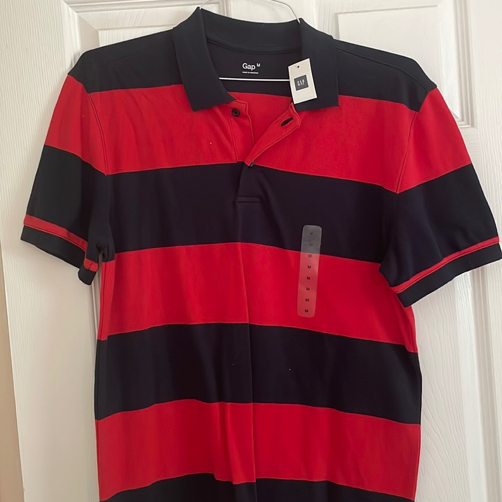 Man red and blue collar shirt.
